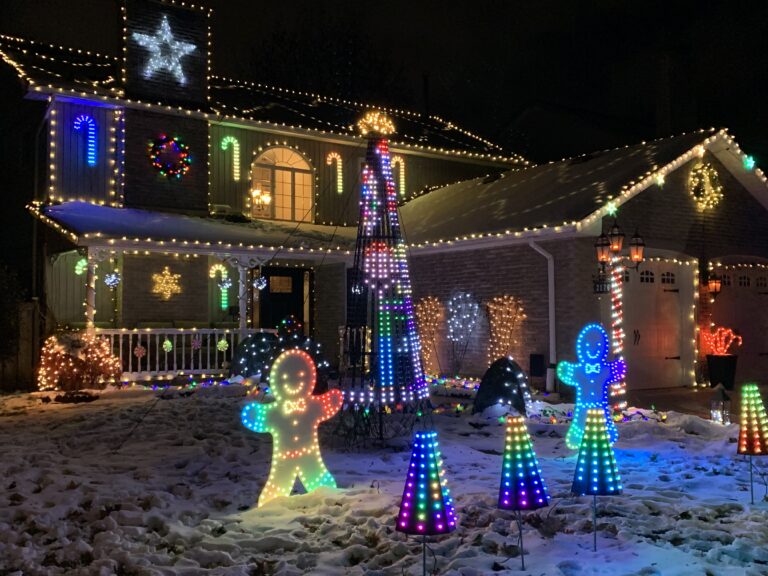 Front view of Rusty Griswold’s Light Display with thousands of synchronized Christmas lights in Burlington, Ontario.